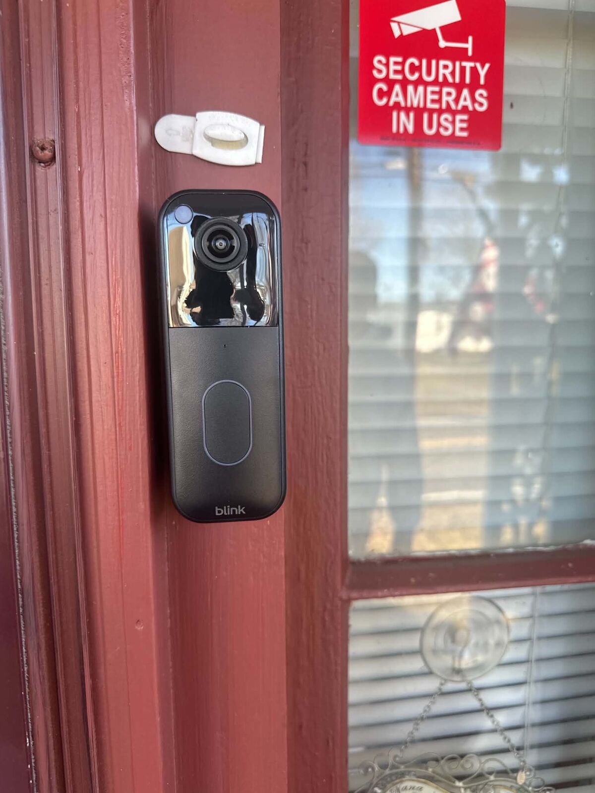 Blink doorbell — front door with signage