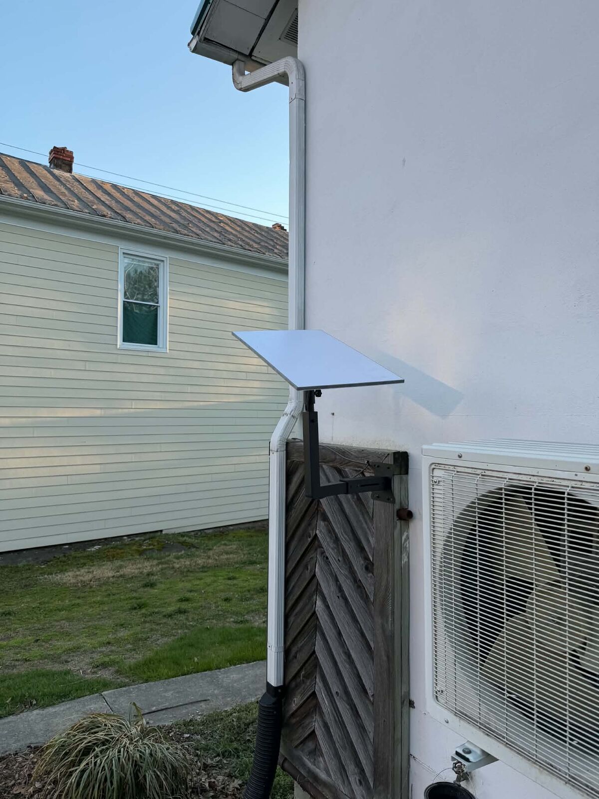 Starlink permanent wall mount on residential building